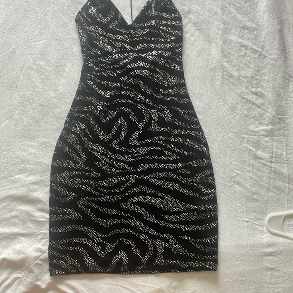 Mini dress , perfect night out dress .
